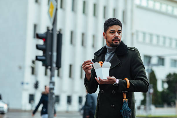 Man eating food in a hurry