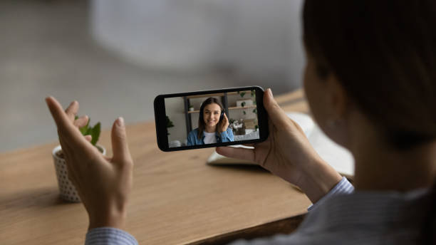 istock Woman have webcam online talk on smartphone 1304943805