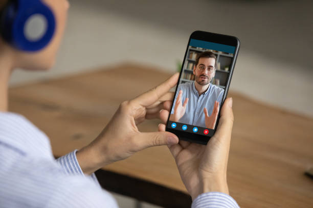 istock Woman talk on video call with male client 1304943857