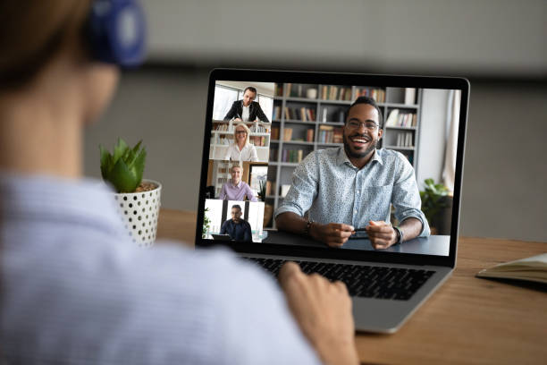 istock Female employee talk on video call with diverse colleagues 1304943883