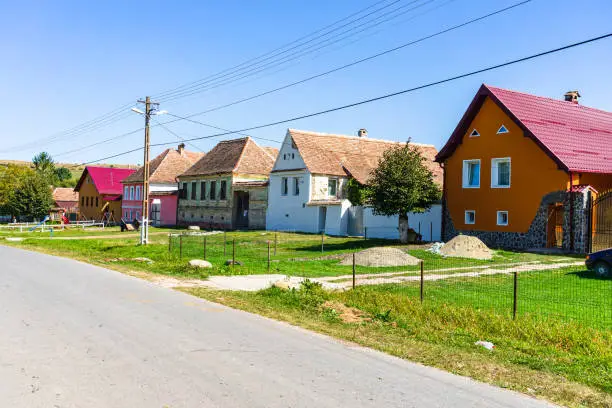 Photo of Typical rural landscape and rustic houses in Barcut -Bekokten, Transylvania, Romania, 2021.