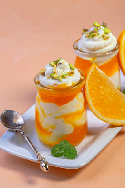 istock Cottage cheese and orange dessert. 1304945354