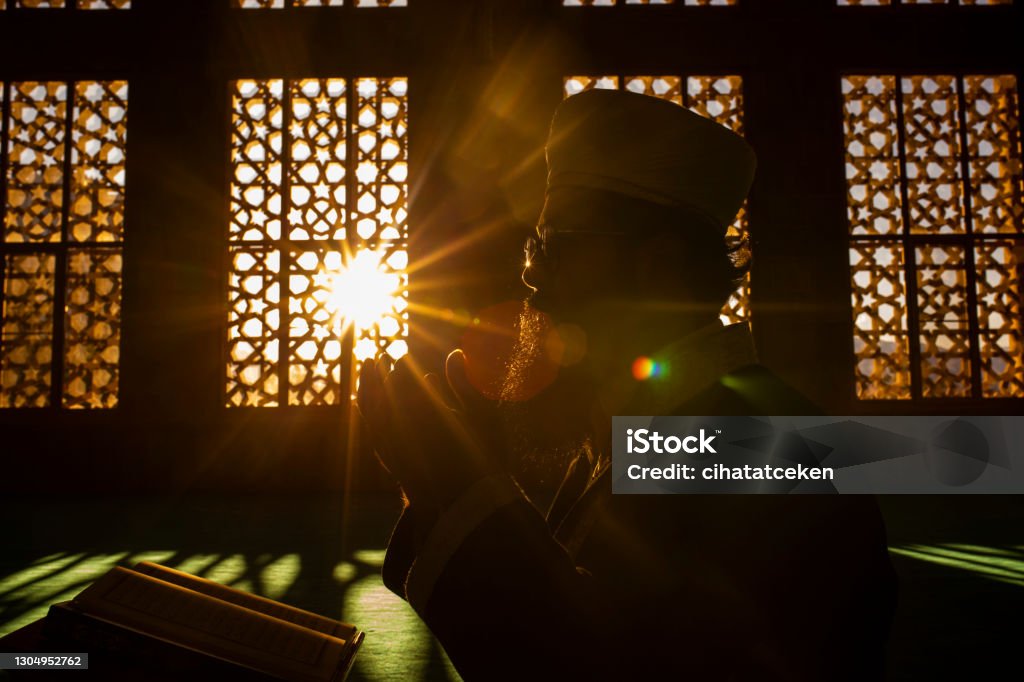 The imam who reads the Quran during Ramadan reading the Quran in Ramadan Ramadan Stock Photo