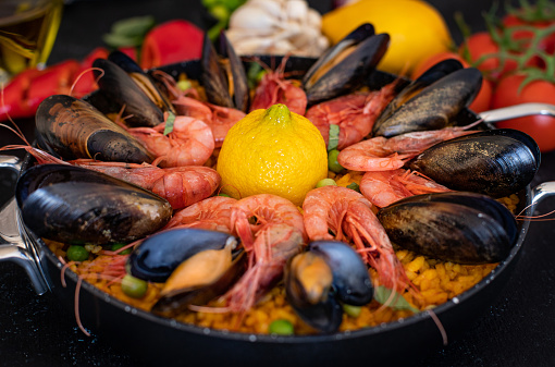 Spain's national dish paella with prawns, cuttlefish, clams and mussels.