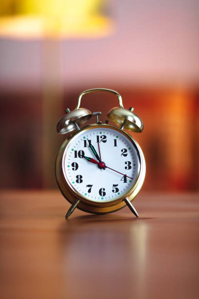 istock old gold alarm clock - 10 O'Clock 1304954416