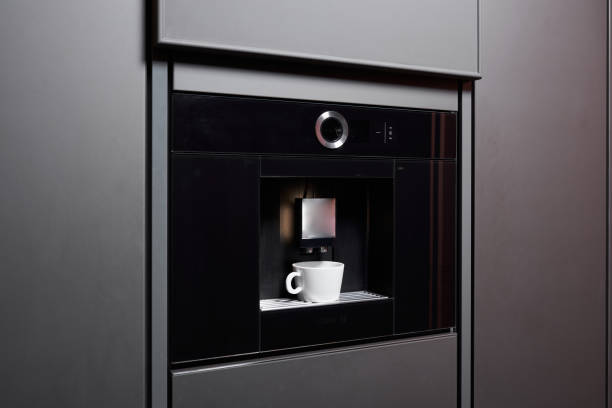 istock Built-in coffee machine in contemporary kitchen 1304957278