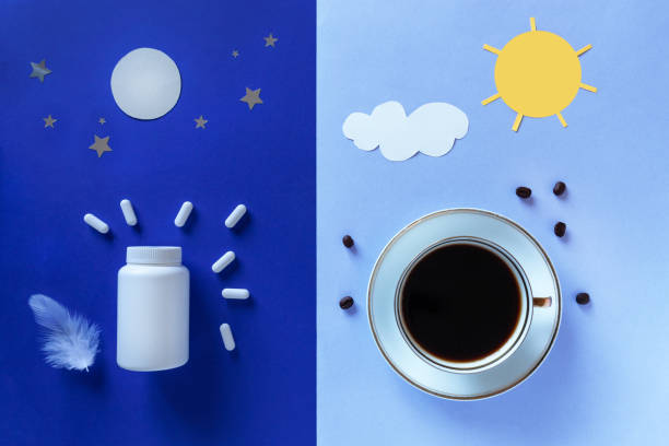 istock White bottle, pills, moon and coffee cup on blue background. Concept Insomnia, full moon time, sleep problems, soporific. Mockup, Top view, Flat lay, Copy space. 1304957603