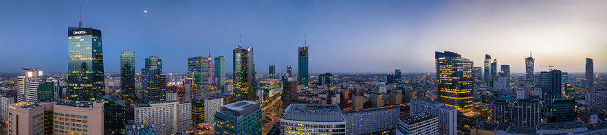 Warszawa, Poland - February 25, 2021: Beautiful architecture of Warszawa city center with modern skyscrapers at dusk, Poland.