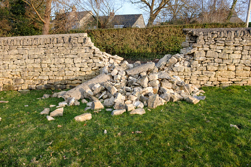 Damaged Dry Stone Wall In The Cotswolds, UK