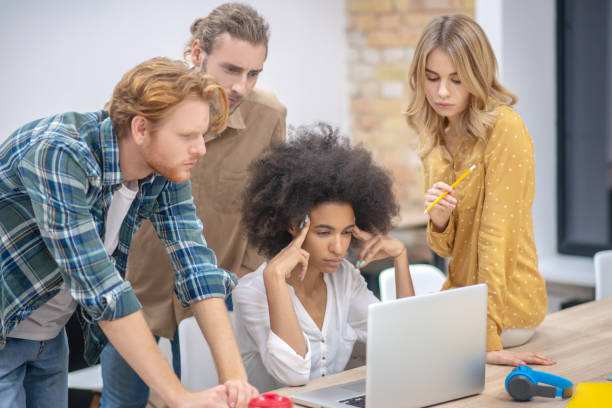 istock Young professionals working ona project and waiting for the results 1304964691