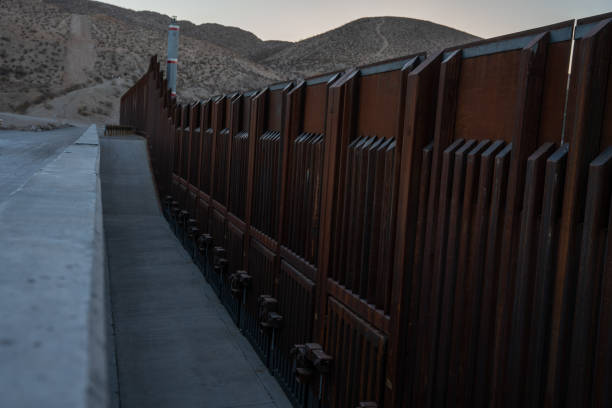 istock Border Wall At the El Paso Border Crossing Into Juarez 1304965143