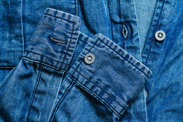 istock Blue denim clothing top view background 1304970763