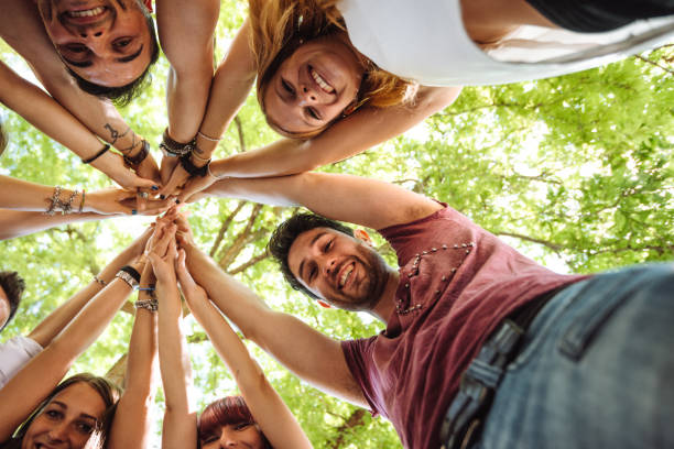 istock people all together connected in the park 1304978728