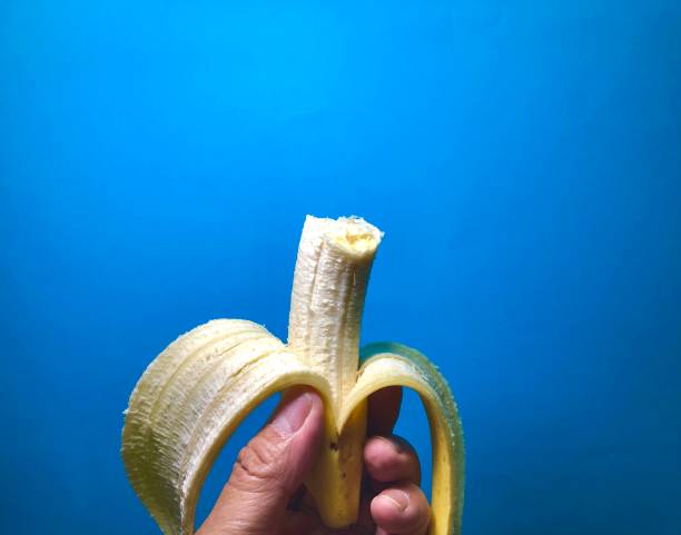 istock Banana being tasted 1304980033