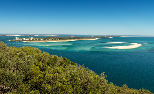 The Troia Peninsula is a sandy sandbank more than 25 km long and 0.5 to 1.5 km wide between the Atlantic Ocean (to the west) and the Sado River estuary (to the east). You can find a casino, several hotels, some restaurants and white sand beaches.