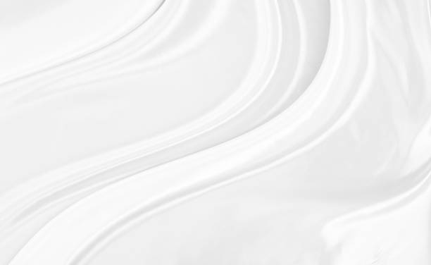 istock White gray satin texture that is white silver fabric silk background with beautiful soft blur pattern natural. 1304990697