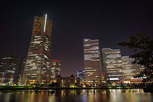 Night view of Yokohama, where there are canals, skyscrapers, Ferris wheels, etc. Photographed on July 31, 2015, Japan.
