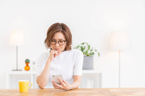 istock senior age woman who uses smart phone,think, 1304995092