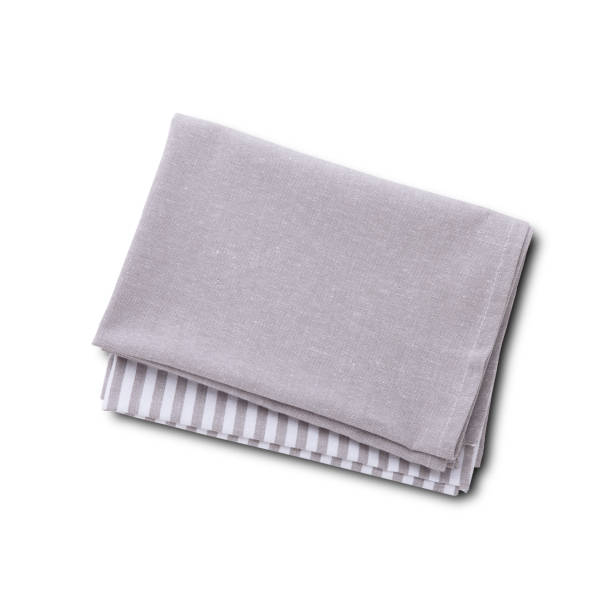 istock Napkins with shadow isolated on white. Multi-colored linen napkins for restaurant. Empty napkins mock up for design. Napkins top view close up. Place for text on napkin. 1305002582
