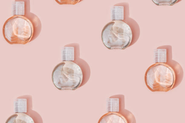 istock Pattern from cosmetic product in transparent plastic bottle, beautiful shadows on background set sail champange colred. 1305010805