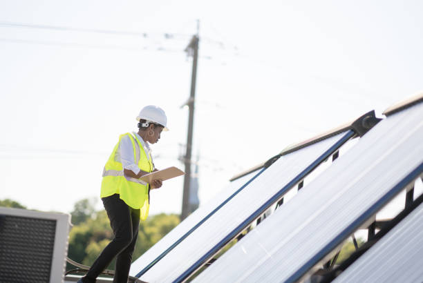 istock Female Engineer Working With Solar Panels Stock Photo 1305011705