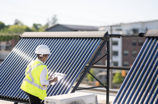 istock Female Engineer Working With Solar Panels Stock Photo 1305011774