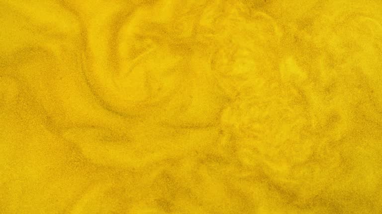 Gold dust, turbulent background. Flowing beautiful. Perfect copy space!