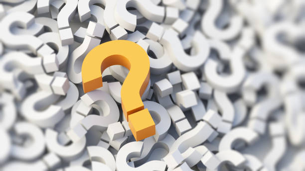 istock Yellow question mark on a background of white signs, FAQ Concept 1305015708