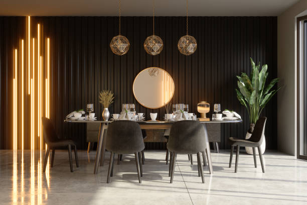 interior luxuoso da sala de jantar com mesa de jantar, objetos decorativos, luzes pendentes e planta em vasos. - sala de jantar - fotografias e filmes do acervo