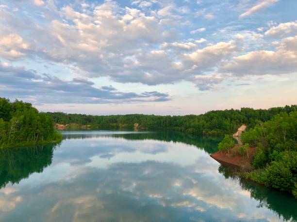 istock Lake with reflection of the sky 1305018782