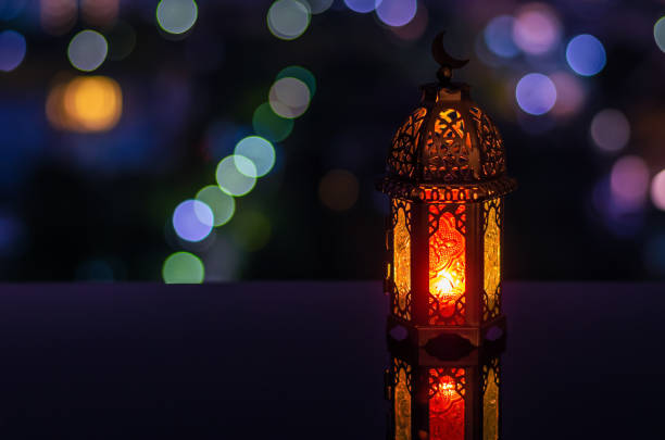 istock Ramadan Kareem lantern with city light background. 1305026507