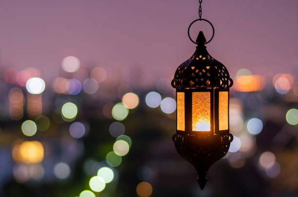 istock Ramadan Kareem lantern with city light background. 1305026508