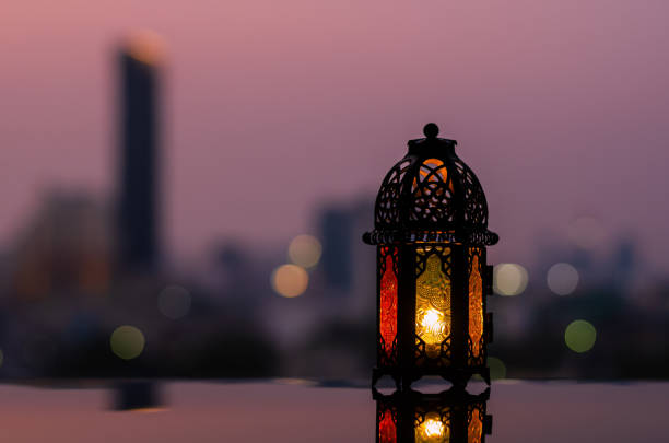 istock Ramadan Kareem lantern with city light background. 1305026523