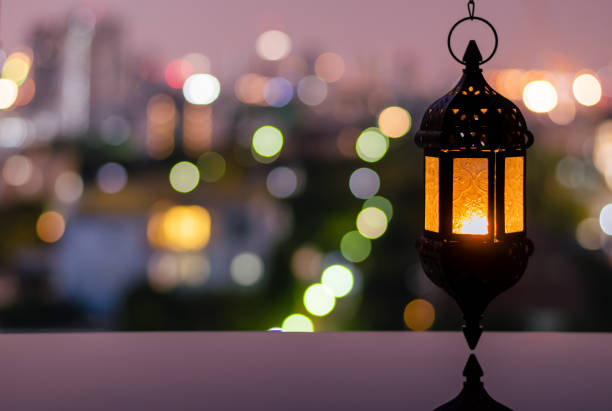 istock Ramadan Kareem lantern with city light background. 1305026528