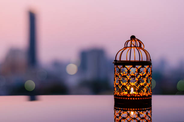 istock Ramadan Kareem lantern with city light background. 1305026539