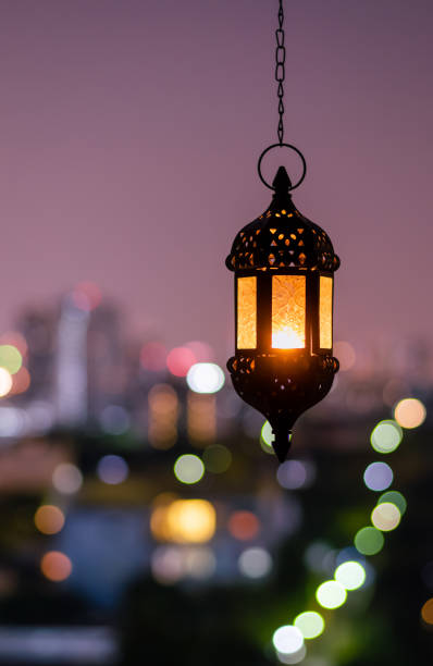 istock Ramadan Kareem lantern with city light background. 1305026547