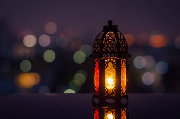 istock Ramadan Kareem lantern with city light background. 1305026555