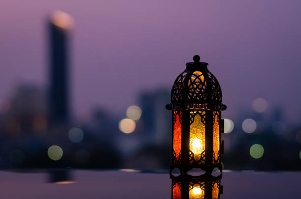 istock Ramadan Kareem lantern with city light background. 1305026596