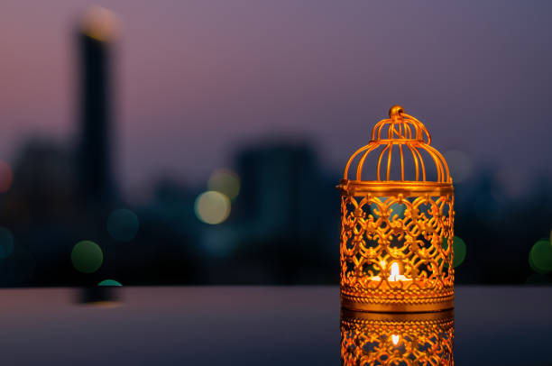istock Ramadan Kareem lantern with city light background. 1305026632