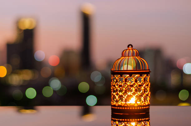 istock Ramadan Kareem lantern with city light background. 1305026633