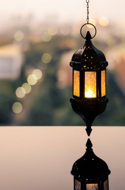 istock Ramadan Kareem lantern with city light background. 1305026641