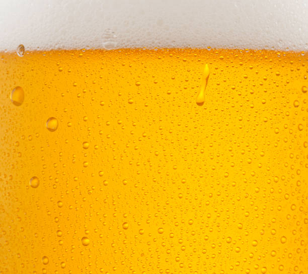 istock Beer Background. Ice Cold Beer Glass With Water Drops Condensation 1305030793