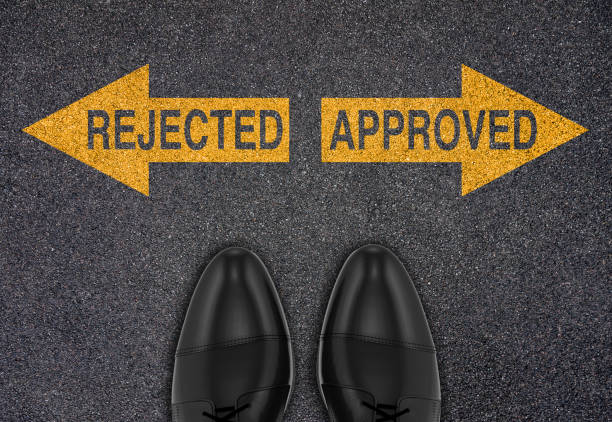 istock Rejected or Approved True or False arrows written on the road 1305030946
