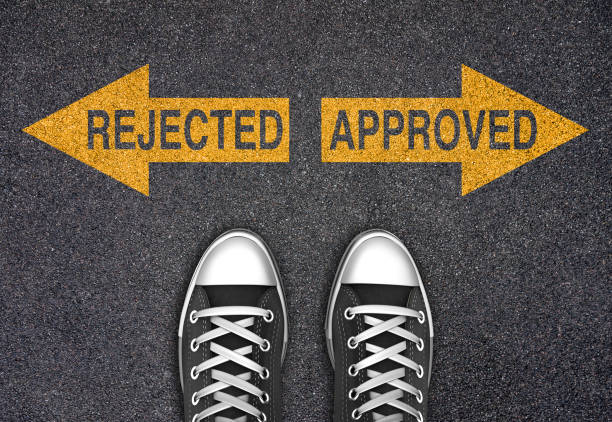 istock Rejected or Approved True or False arrows written on the road 1305030956