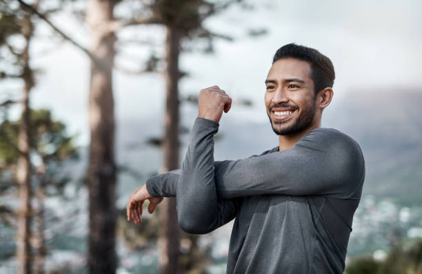 istock Warming up my body for my run 1305034178