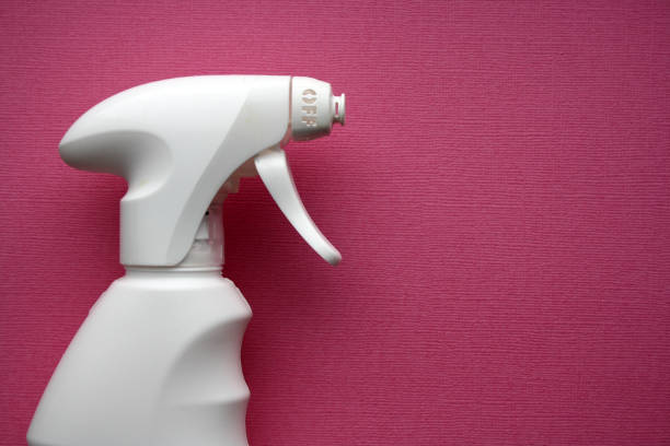 istock White spray isolated on a pink background. 1305034341