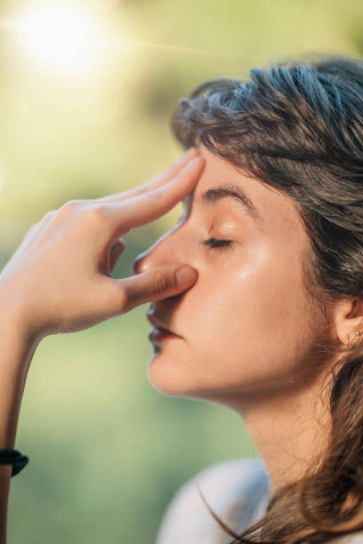 istock Young Woman Practicing Pranayama Yoga Breathing Technique Outdoor 1305035521