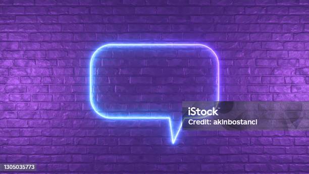 Neon Lighting Glowing Speech Bubble On Black Brick Wall Stock Photo - Download Image Now
