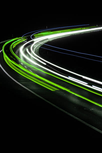 istock green lines on a black background texture 1305036776
