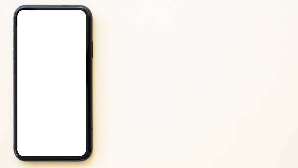 istock Flat lay with copy space, a smartphone with white screen is arranged on a cream colored background. Concept of showing information on a display, touch screen, smart device. 1305038409